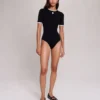 Bodysuit i öppen stickning Bodysuit i öppen stickning