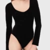 Bodysuit i sammet med korsettdetaljer Bodysuit i sammet med korsettdetaljer