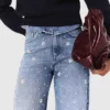 Brodade jeans med vida ben
