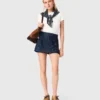 Broderad denimskort med lager-på-lager-effekt Broderad denimskort med lager-på-lager-effekt