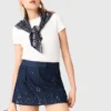 Broderad denimskort med lager-på-lager-effekt Broderad denimskort med lager-på-lager-effekt