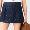 Broderad denimskort med lager-på-lager-effekt Broderad denimskort med lager-på-lager-effekt