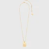 Halsband med stjärnteckensplakett
