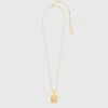 Halsband med stjärnteckensplakett