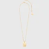 Halsband med stjärnteckensplakett