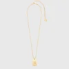Halsband med stjärnteckensplakett