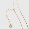Halsband med stjärnteckensplakett