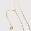 Halsband med stjärnteckensplakett