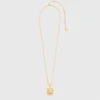 Halsband med stjärnteckensplakett
