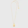 Halsband med stjärnteckensplakett