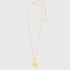 Halsband med stjärnteckensplakett