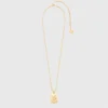 Halsband med stjärnteckensplakett