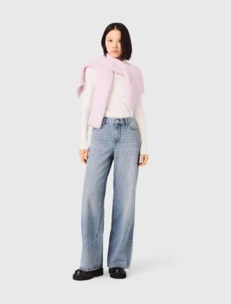 Jeans med vida ben och strass över hela plagget