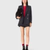Kostymjacka med guldknappar