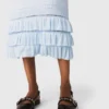 Lång volangstickad kjol