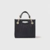 Mini-toteväska i quiltat läder Mini-toteväska i quiltat läder