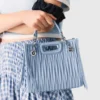 Mini-toteväska i quiltat läder Mini-toteväska i quiltat läder