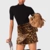 Minikjol i fuskpäls med leopardmönster