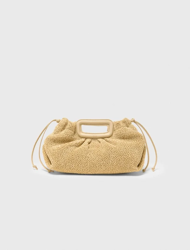 Mipli-clutch med bouclé-effekt Mipli-clutch med bouclé-effekt