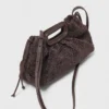 Mipli-clutch med bouclé-effekt Mipli-clutch med bouclé-effekt
