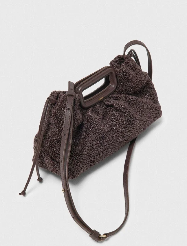 Mipli-clutch med bouclé-effekt Mipli-clutch med bouclé-effekt