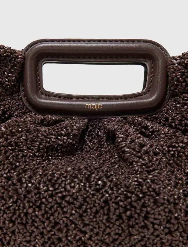 Mipli-clutch med bouclé-effekt Mipli-clutch med bouclé-effekt