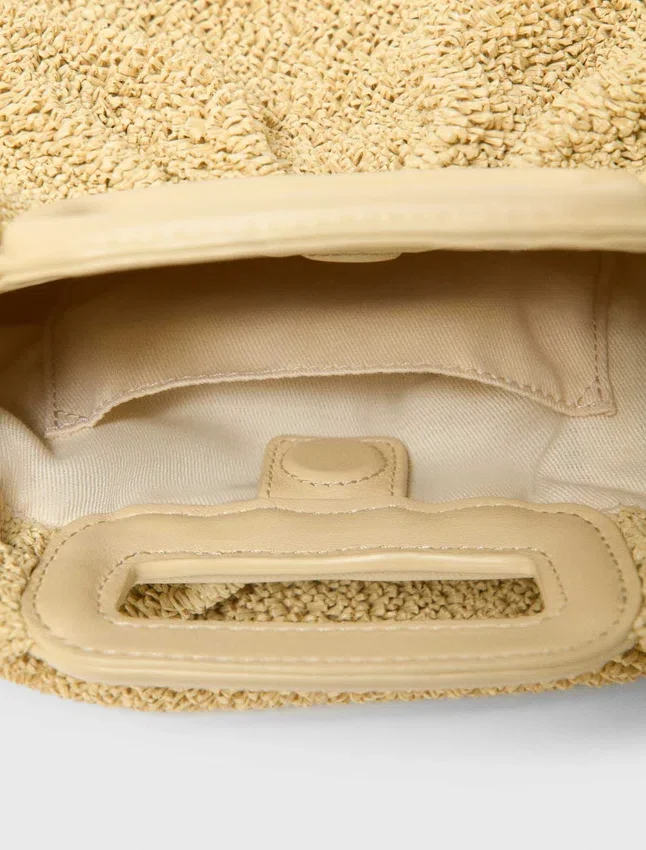 Mipli-clutch med bouclé-effekt Mipli-clutch med bouclé-effekt