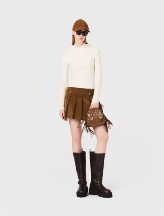 Plisserad minikjol i corduroy