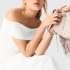 Ribbstickad topp med bardot-ringning