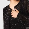 Strickad kofta med strass Strickad kofta med strass