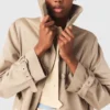 Trenchcoat med avtagbar huva Trenchcoat med avtagbar huva